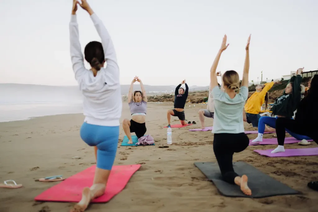 Beachfront yoga class at surf camp