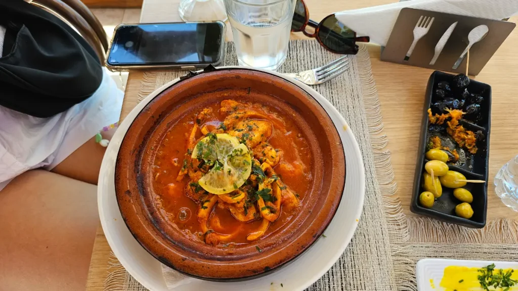 Traditional Moroccan tagine meal at surf camp