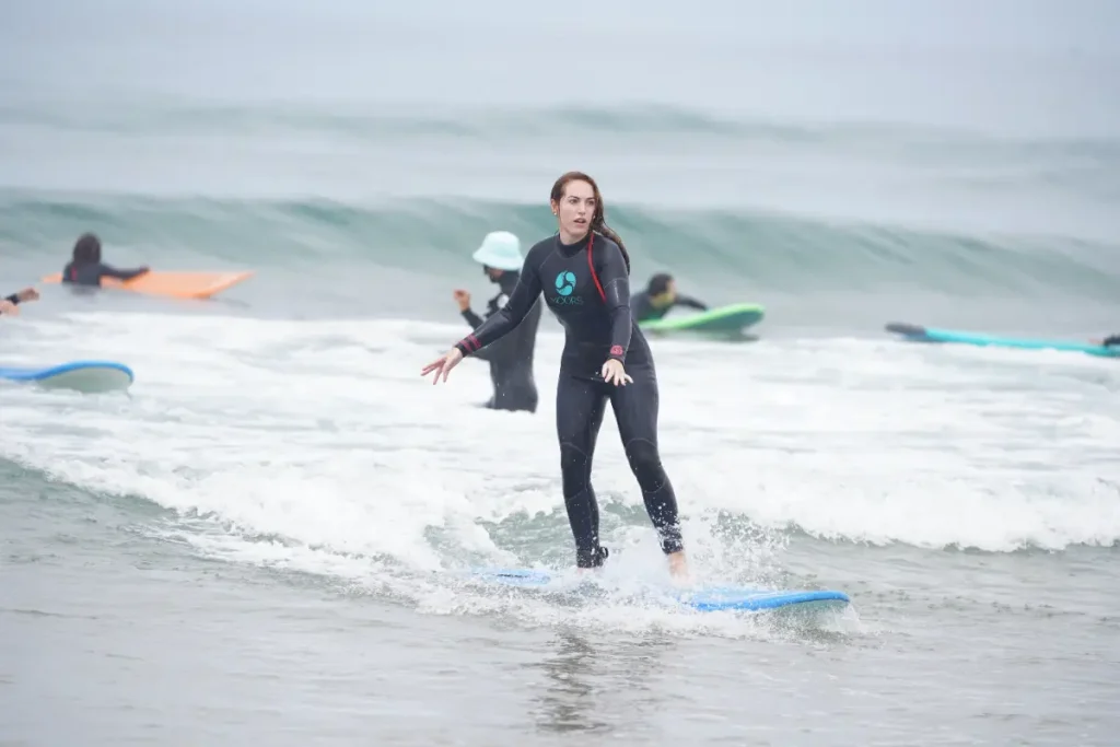 Surfer riding a wave during a lesson in Morocco