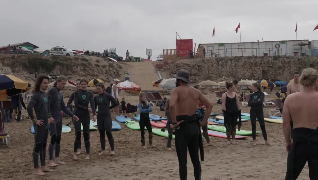 Surfer catching a wave at Taghazout surf camp, Morocco